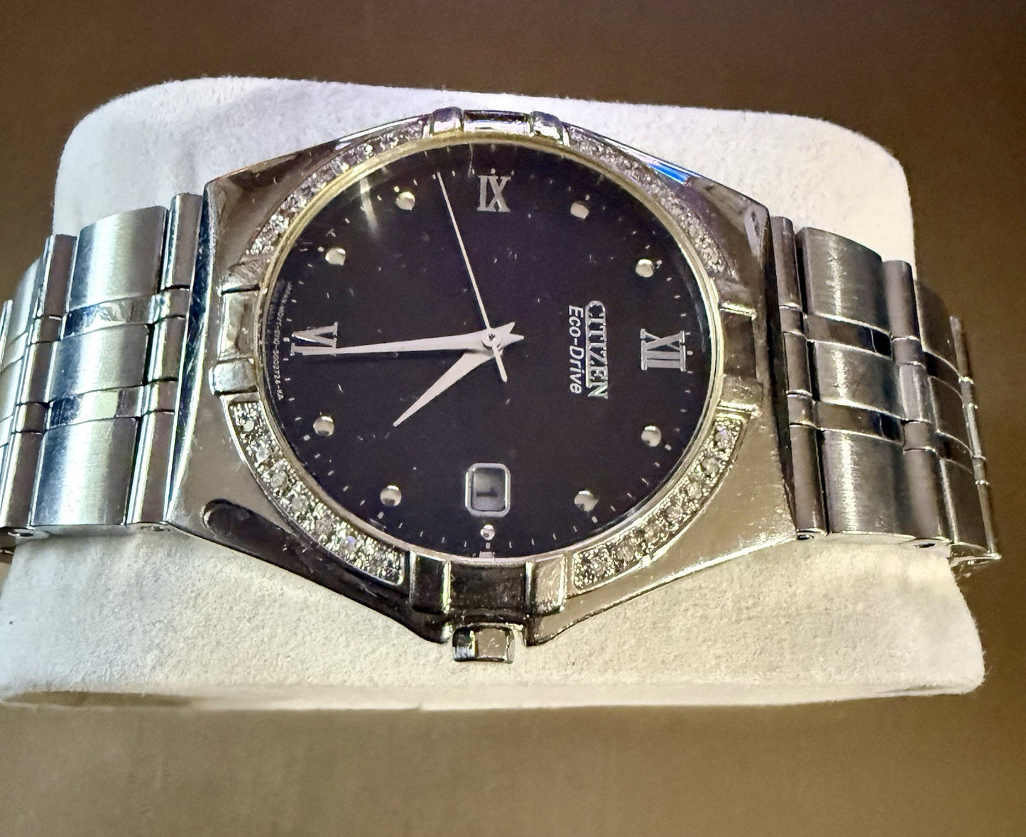 Citizen Eco-Drive Watch with a black dial and stainless steel band