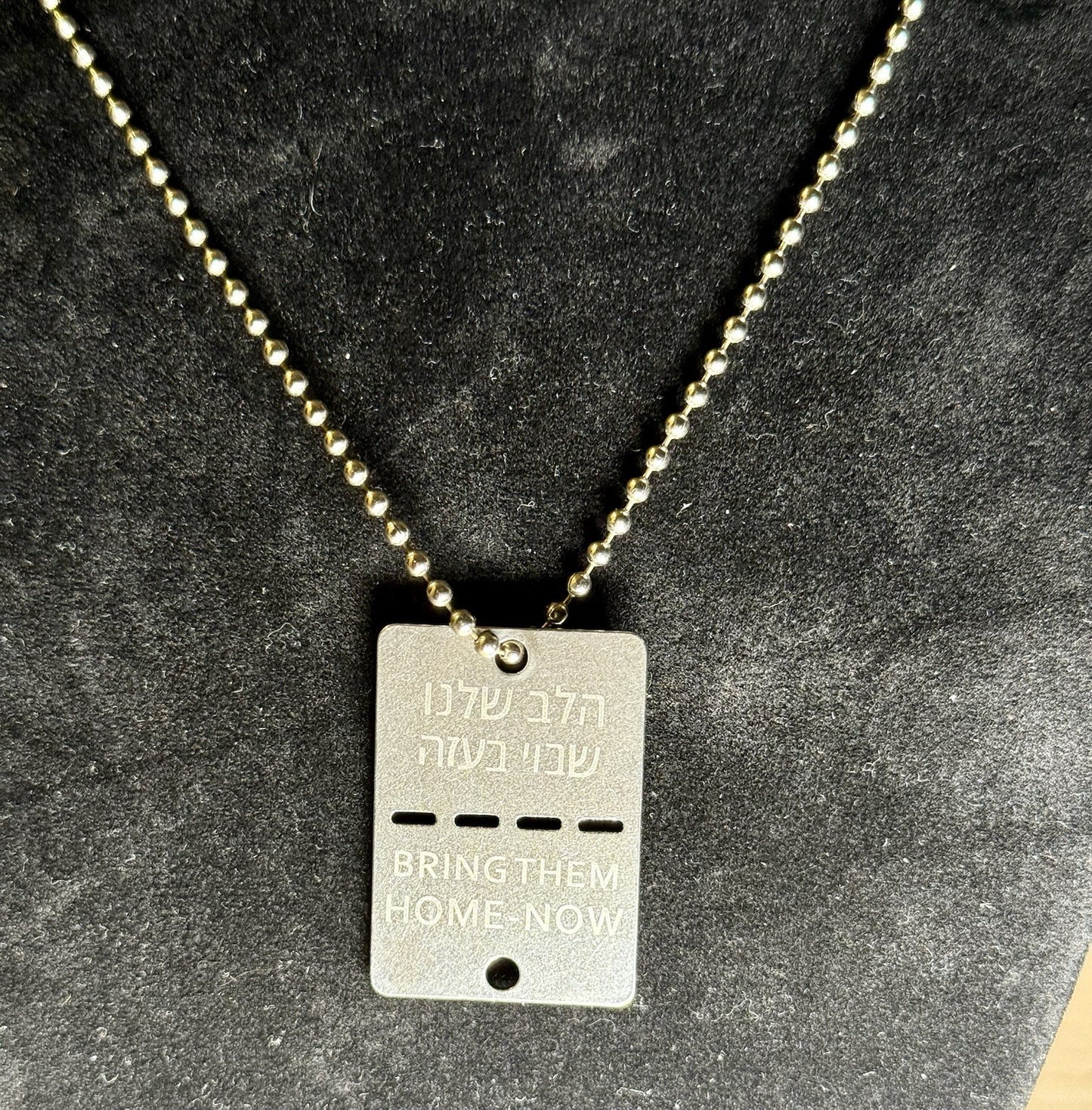 Bring Them Home Now" dog tag necklace