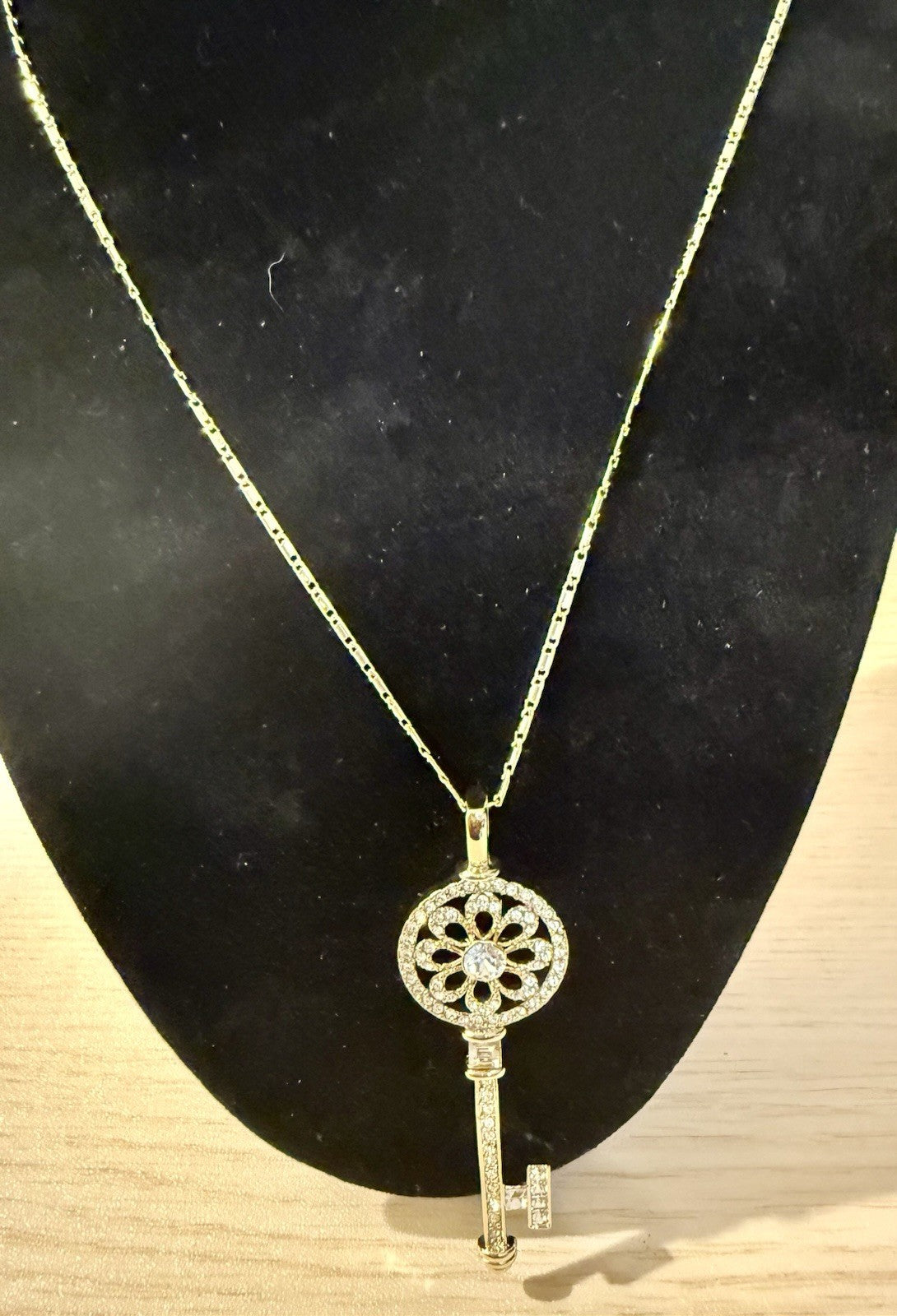 Gold Tone Necklace with Golds Tone Crystal Flower Key Pendant 