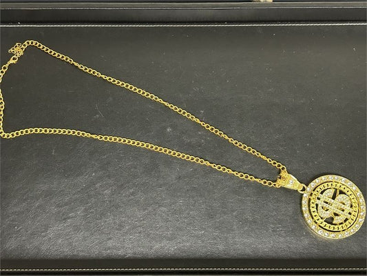 Gold Tone Necklace with Spinner Gold Tone $ Sign Charm