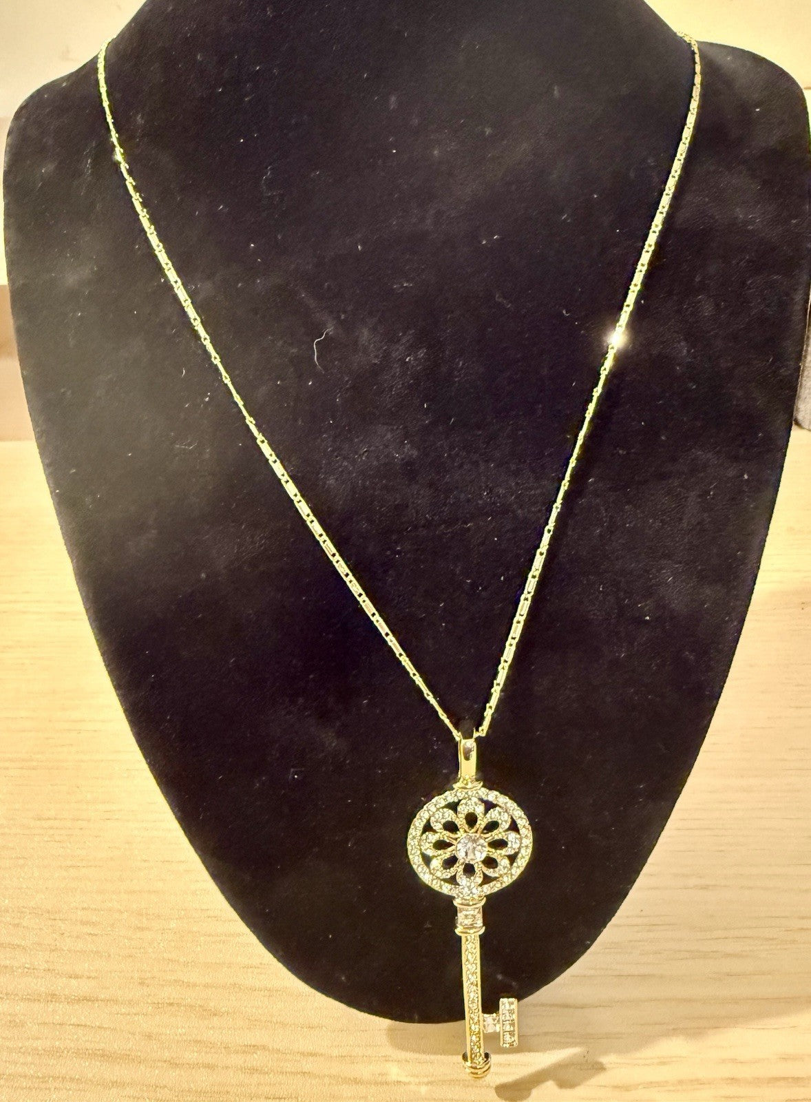 Gold Tone Necklace with Golds Tone Crystal Flower Key Pendant 