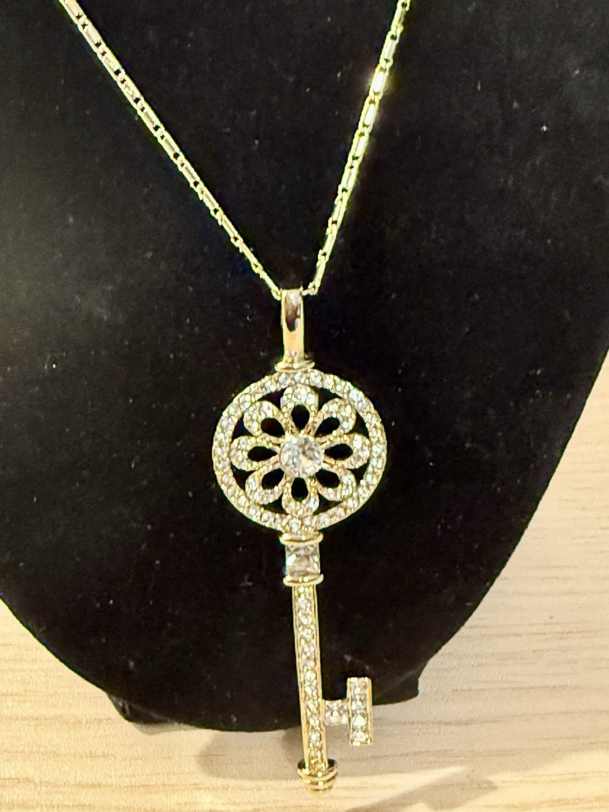 Gold Tone Necklace with Golds Tone Crystal Flower Key Pendant 